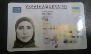 Скоро українки зможуть фотографуватися на документи в хустці